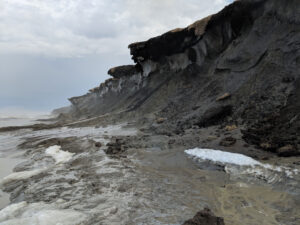 Photograph-of-the-actively-eroding-coastal-permafrost-bluff-on-Barter-Island-locate-on-the-northern-coast-of-Alaska-USGS